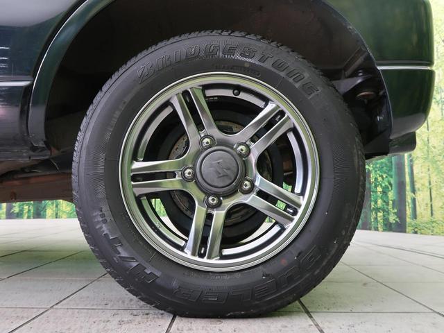 ランドベンチャー 4WD 禁煙車 SDナビ バックカメラ ETC シートヒーター プライバシーガラス 純正16インチアルミホイール CD DVD再生 ドアバイザー 地上波TV 電動格納ミラー 盗難防止システム(42枚目)