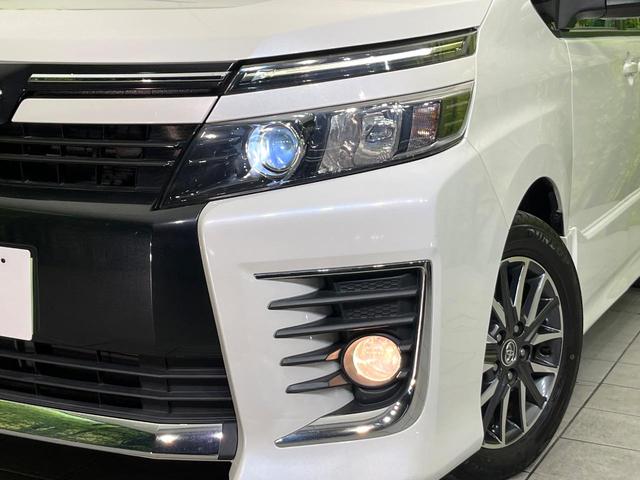ヴォクシー ＺＳ　禁煙車　後席モニター　純正９型ナビ　Ｂｌｕｅｔｏｏｔｈ／ＣＤ再生　バックカメラ　両側電動スライド　ドラレコ　スマートキー　ＬＥＤヘッド　ＥＴＣ　オートライト　デュアルエアコン　リアエアコン（13枚目）