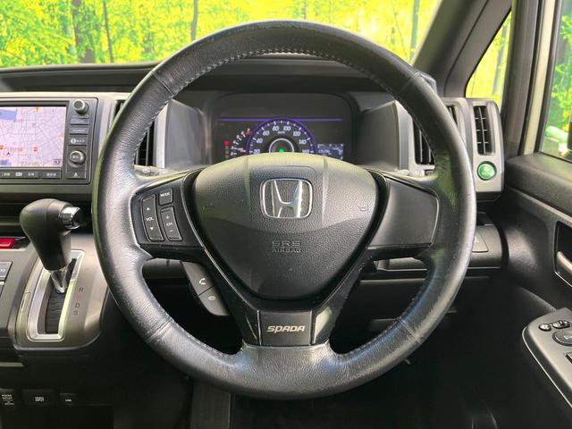 ステップワゴンスパーダ クールスピリット　禁煙車　フリップダウンモニター　純正ＨＤＤナビ　Ｂｌｕｅｔｏｏｔｈ／ＣＤ／ＤＶＤ再生　フルセグ　全周囲カメラ　両側電動スライドドア　ＨＩＤヘッド　ＥＴＣ　オートライト　オートエアコン（8枚目）
