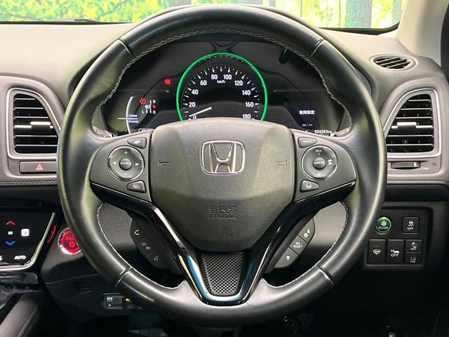 ヴェゼル ハイブリッドＺ・ホンダセンシング　禁煙車　純正８インチナビ　バックカメラ　フルセグ　ＣＤ／ＤＶＤ再生　Ｂｌｕｅｔｏｏｔｈ接続　衝突軽減装置　アダプティブクルコン　ＬＥＤヘッド／フォグライト　オートハイビーム　前席シートヒーター　ＥＴＣ（8枚目）
