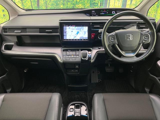 ステップワゴンスパーダ スパーダハイブリッド G・EX ホンダセンシング 禁煙車 後期型 純正9型ナビ 全周囲カメラ フルセグ CD/DVD Bluetooth接続 純正フリップダウンモニター 衝突軽減装置 オートハイビーム 両側電動スライドドア 後席オートエアコン ETC(2枚目)