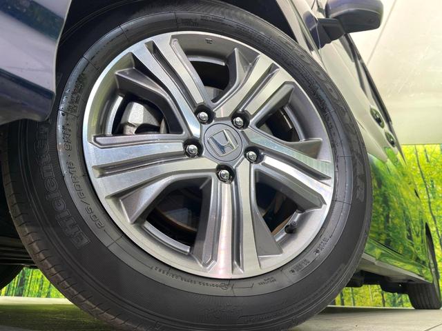 ステップワゴンスパーダ スパーダハイブリッド G・EX ホンダセンシング 禁煙車 後期型 純正9型ナビ 全周囲カメラ フルセグ CD/DVD Bluetooth接続 純正フリップダウンモニター 衝突軽減装置 オートハイビーム 両側電動スライドドア 後席オートエアコン ETC(14枚目)