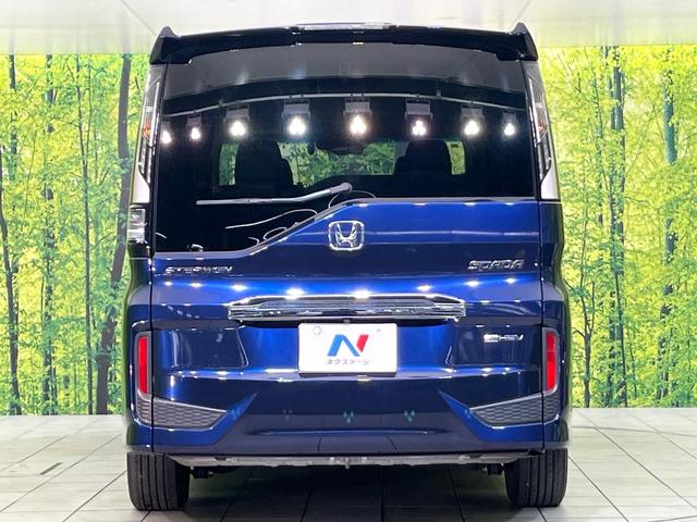 ステップワゴンスパーダ スパーダハイブリッド G・EX ホンダセンシング 禁煙車 後期型 純正9型ナビ 全周囲カメラ フルセグ CD/DVD Bluetooth接続 純正フリップダウンモニター 衝突軽減装置 オートハイビーム 両側電動スライドドア 後席オートエアコン ETC(16枚目)