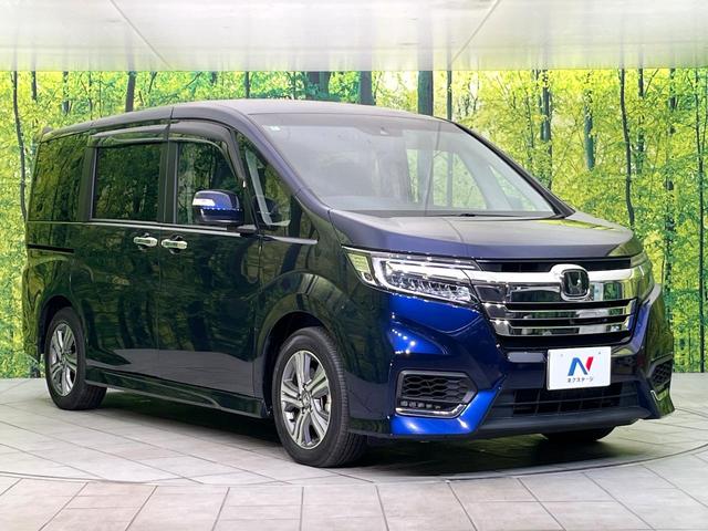ステップワゴンスパーダ スパーダハイブリッド G・EX ホンダセンシング 禁煙車 後期型 純正9型ナビ 全周囲カメラ フルセグ CD/DVD Bluetooth接続 純正フリップダウンモニター 衝突軽減装置 オートハイビーム 両側電動スライドドア 後席オートエアコン ETC(17枚目)