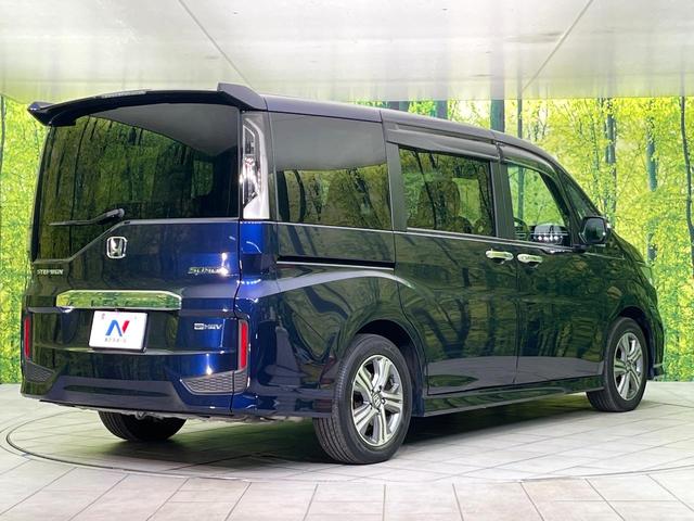 ステップワゴンスパーダ スパーダハイブリッド G・EX ホンダセンシング 禁煙車 後期型 純正9型ナビ 全周囲カメラ フルセグ CD/DVD Bluetooth接続 純正フリップダウンモニター 衝突軽減装置 オートハイビーム 両側電動スライドドア 後席オートエアコン ETC(18枚目)