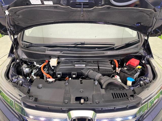 ステップワゴンスパーダ スパーダハイブリッド G・EX ホンダセンシング 禁煙車 後期型 純正9型ナビ 全周囲カメラ フルセグ CD/DVD Bluetooth接続 純正フリップダウンモニター 衝突軽減装置 オートハイビーム 両側電動スライドドア 後席オートエアコン ETC(19枚目)