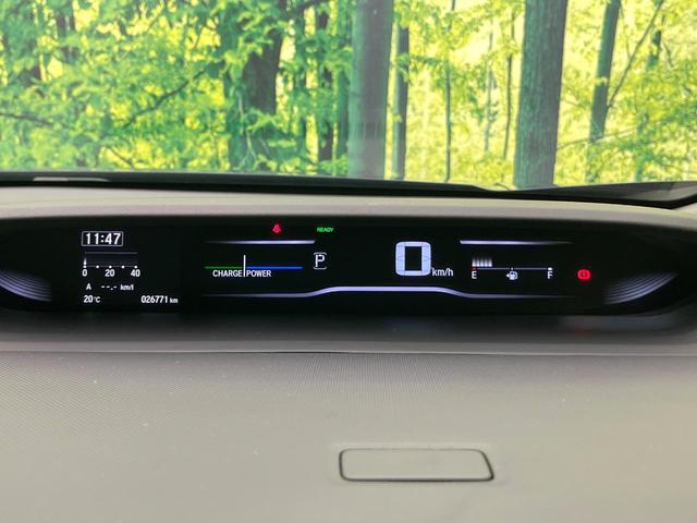 ステップワゴンスパーダ スパーダハイブリッド G・EX ホンダセンシング 禁煙車 後期型 純正9型ナビ 全周囲カメラ フルセグ CD/DVD Bluetooth接続 純正フリップダウンモニター 衝突軽減装置 オートハイビーム 両側電動スライドドア 後席オートエアコン ETC(25枚目)