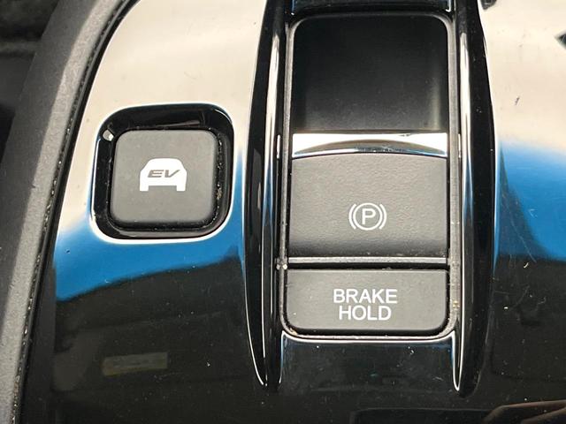 ステップワゴンスパーダ スパーダハイブリッド G・EX ホンダセンシング 禁煙車 後期型 純正9型ナビ 全周囲カメラ フルセグ CD/DVD Bluetooth接続 純正フリップダウンモニター 衝突軽減装置 オートハイビーム 両側電動スライドドア 後席オートエアコン ETC(27枚目)