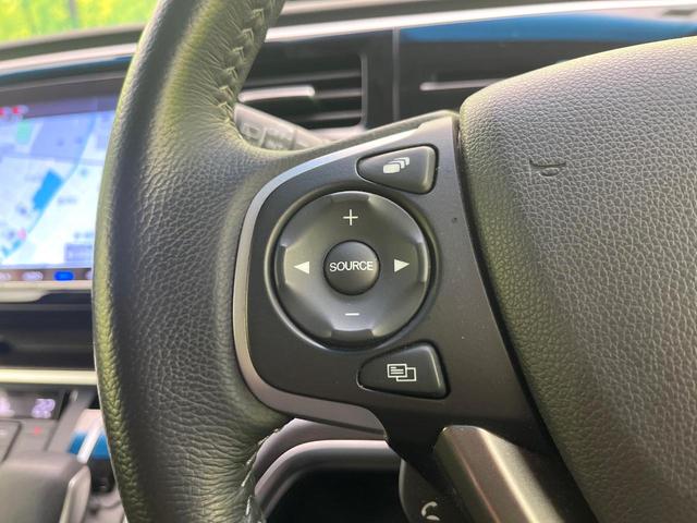 ステップワゴンスパーダ スパーダハイブリッド G・EX ホンダセンシング 禁煙車 後期型 純正9型ナビ 全周囲カメラ フルセグ CD/DVD Bluetooth接続 純正フリップダウンモニター 衝突軽減装置 オートハイビーム 両側電動スライドドア 後席オートエアコン ETC(31枚目)