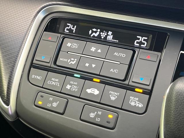 ステップワゴンスパーダ スパーダハイブリッド G・EX ホンダセンシング 禁煙車 後期型 純正9型ナビ 全周囲カメラ フルセグ CD/DVD Bluetooth接続 純正フリップダウンモニター 衝突軽減装置 オートハイビーム 両側電動スライドドア 後席オートエアコン ETC(35枚目)