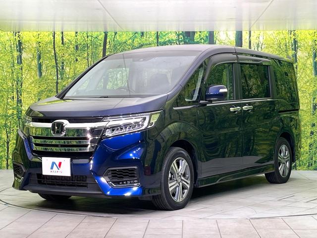 ステップワゴンスパーダ スパーダハイブリッド G・EX ホンダセンシング 禁煙車 後期型 純正9型ナビ 全周囲カメラ フルセグ CD/DVD Bluetooth接続 純正フリップダウンモニター 衝突軽減装置 オートハイビーム 両側電動スライドドア 後席オートエアコン ETC(66枚目)