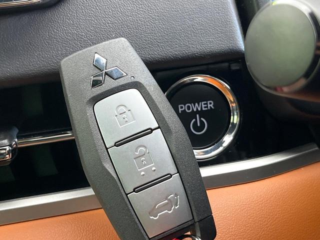 アウトランダーPHEV P 4WD 禁煙車 サンルーフ 純正9型ナビ 全周囲カメラ フルセグ Bluetooth BOSEサウンド 衝突軽減装置 LEDヘッド/フォグ オートハイビーム シーケンシャルターンランプ 電動リアゲート(52枚目)