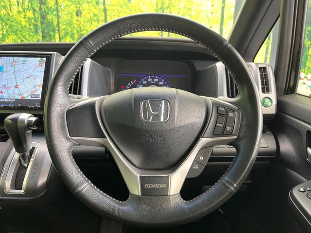 ステップワゴンスパーダ Z クールスピリット 禁煙車 後席モニター 純正9型ナビ DVD/CD再生 バックカメラ 両側電動スライド ハーフレザーシート HIDヘッド オートライト オートエアコン リアエアコン 純正17インチアルミホイール ETC(8枚目)