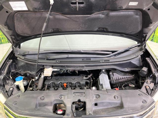 ステップワゴンスパーダ Z クールスピリット 禁煙車 後席モニター 純正9型ナビ DVD/CD再生 バックカメラ 両側電動スライド ハーフレザーシート HIDヘッド オートライト オートエアコン リアエアコン 純正17インチアルミホイール ETC(19枚目)