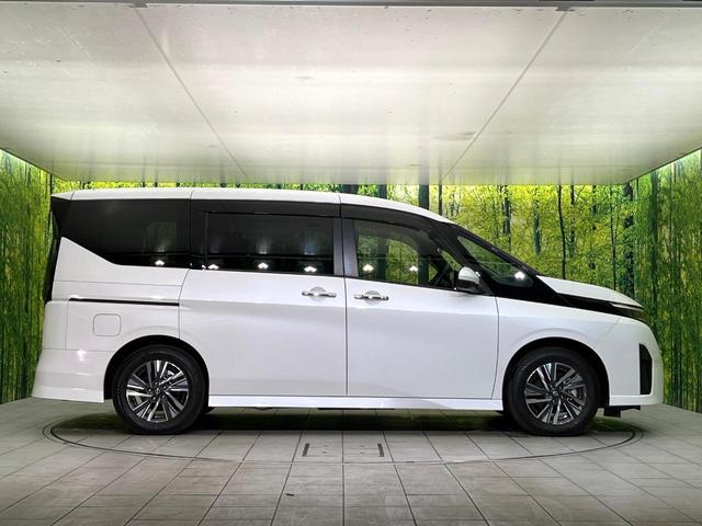 セレナ ハイウェイスターＶ　禁煙車　寒冷地仕様　純正１２型ナビ　全周囲カメラ　フルセグ　Ｂｌｕｅｔｏｏｔｈ　純正フリップダウンモニター　衝突軽減装置　ＬＥＤヘッド／フォグライト　オートハイビーム　プロパイロット　両側電動スライド（66枚目）