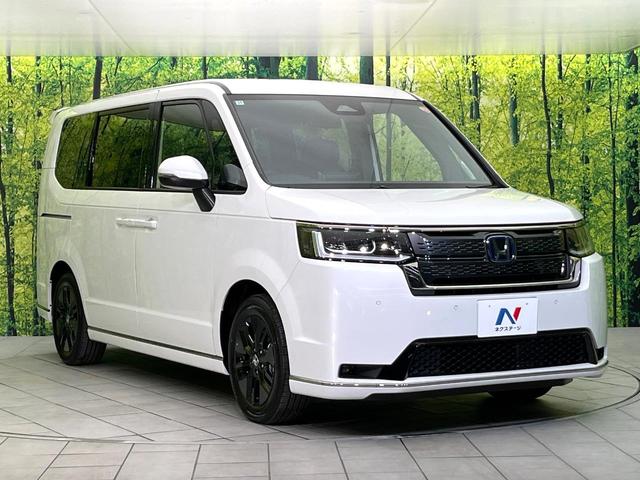 ステップワゴン e:HEVスパーダ 登録済未使用車 現行型 純正11.4型ナビ バックカメラ フルセグ Bluetooth CD/DVD 衝突軽減装置 アダプティブクルコン LEDヘッド/フォグライト 両側電動スライドドア オートライト(17枚目)