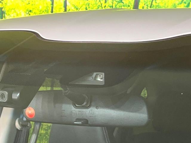 フリードハイブリッド ハイブリッド・Ｇ　禁煙車　純正９型ナビ　バックカメラ　Ｂｌｕｅｔｏｏｔｈ　ＣＤ／ＤＶＤ再生　純正フリップダウンモニター　衝突軽減装置　アダプティブクルコン　ＬＥＤヘッドライト　両側電動スライドドア　前席シートヒーター（5枚目）