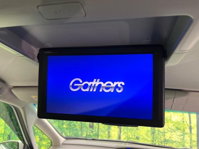 フリードハイブリッド ハイブリッド・Ｇ　禁煙車　純正９型ナビ　バックカメラ　Ｂｌｕｅｔｏｏｔｈ　ＣＤ／ＤＶＤ再生　純正フリップダウンモニター　衝突軽減装置　アダプティブクルコン　ＬＥＤヘッドライト　両側電動スライドドア　前席シートヒーター（6枚目）