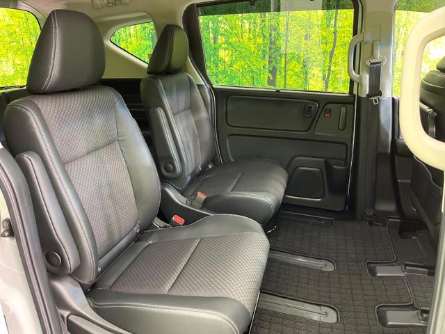 フリードハイブリッド ハイブリッド・Ｇ　禁煙車　純正９型ナビ　バックカメラ　Ｂｌｕｅｔｏｏｔｈ　ＣＤ／ＤＶＤ再生　純正フリップダウンモニター　衝突軽減装置　アダプティブクルコン　ＬＥＤヘッドライト　両側電動スライドドア　前席シートヒーター（10枚目）