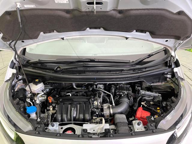 フリードハイブリッド ハイブリッド・Ｇ　禁煙車　純正９型ナビ　バックカメラ　Ｂｌｕｅｔｏｏｔｈ　ＣＤ／ＤＶＤ再生　純正フリップダウンモニター　衝突軽減装置　アダプティブクルコン　ＬＥＤヘッドライト　両側電動スライドドア　前席シートヒーター（19枚目）