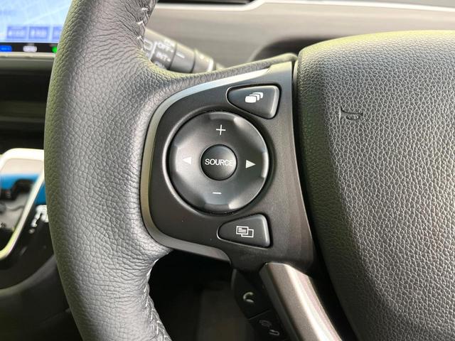 フリードハイブリッド ハイブリッド・Ｇ　禁煙車　純正９型ナビ　バックカメラ　Ｂｌｕｅｔｏｏｔｈ　ＣＤ／ＤＶＤ再生　純正フリップダウンモニター　衝突軽減装置　アダプティブクルコン　ＬＥＤヘッドライト　両側電動スライドドア　前席シートヒーター（28枚目）