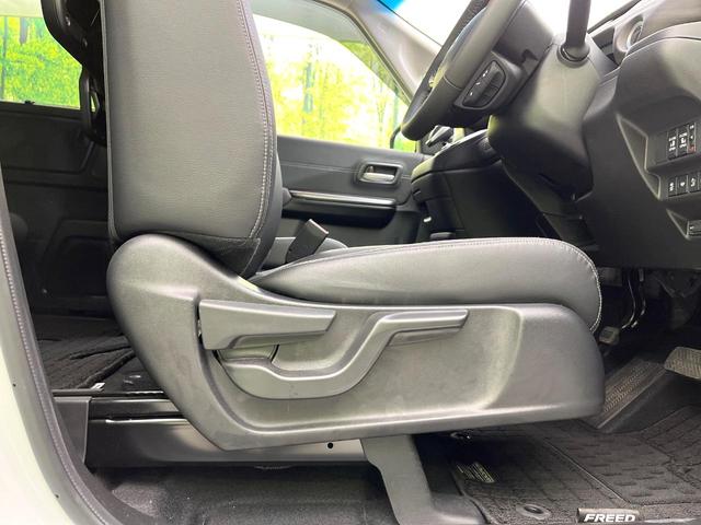 フリードハイブリッド ハイブリッド・Ｇ　禁煙車　純正９型ナビ　バックカメラ　Ｂｌｕｅｔｏｏｔｈ　ＣＤ／ＤＶＤ再生　純正フリップダウンモニター　衝突軽減装置　アダプティブクルコン　ＬＥＤヘッドライト　両側電動スライドドア　前席シートヒーター（45枚目）