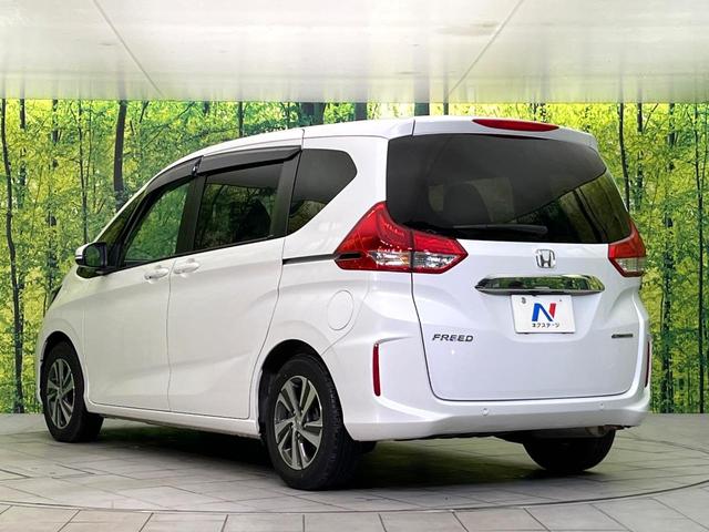 フリードハイブリッド ハイブリッド・Ｇ　禁煙車　純正９型ナビ　バックカメラ　Ｂｌｕｅｔｏｏｔｈ　ＣＤ／ＤＶＤ再生　純正フリップダウンモニター　衝突軽減装置　アダプティブクルコン　ＬＥＤヘッドライト　両側電動スライドドア　前席シートヒーター（62枚目）