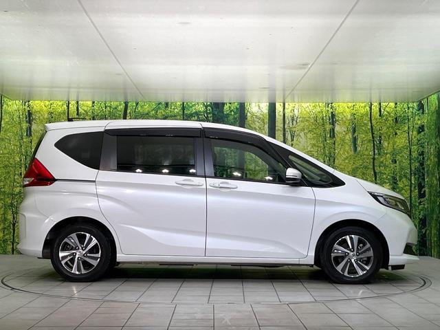 フリードハイブリッド ハイブリッド・Ｇ　禁煙車　純正９型ナビ　バックカメラ　Ｂｌｕｅｔｏｏｔｈ　ＣＤ／ＤＶＤ再生　純正フリップダウンモニター　衝突軽減装置　アダプティブクルコン　ＬＥＤヘッドライト　両側電動スライドドア　前席シートヒーター（63枚目）