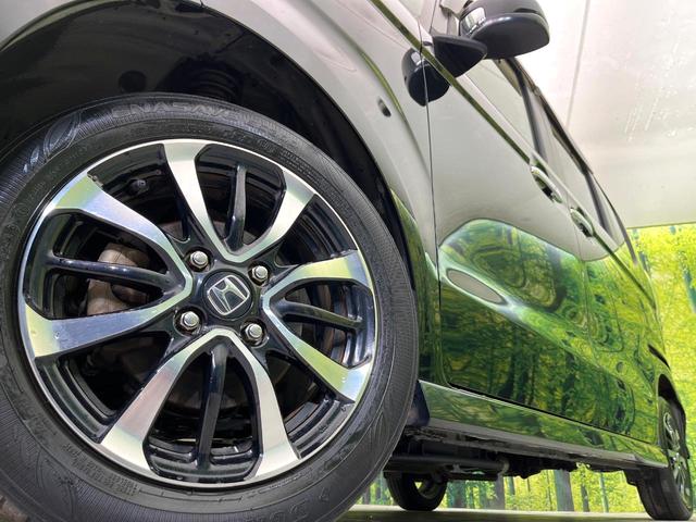 N-BOXカスタム G・Lホンダセンシング 4WD 禁煙車 SDナビ バックカメラ CD/DVD Bluetooth 衝突軽減装置 アダプティブクルコン レーンアシスト LEDヘッド/フォグ オートハイビーム 電動スライドドア 後席サンシェード(13枚目)