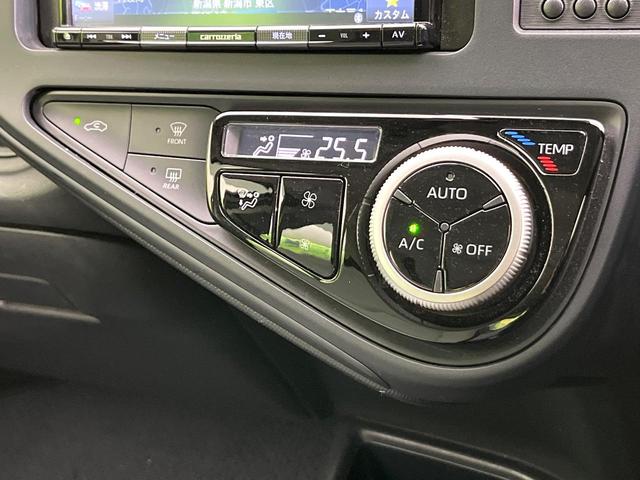 アクア L 禁煙車 メモリーナビ バックカメラ Bluetooth/CD/DVD再生 地デジ 衝突軽減装置 オートハイビーム 横滑り防止装置 オートエアコン キーレス 盗難防止装置 ETC プライバシーガラス(7枚目)
