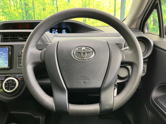 アクア L 禁煙車 メモリーナビ バックカメラ Bluetooth/CD/DVD再生 地デジ 衝突軽減装置 オートハイビーム 横滑り防止装置 オートエアコン キーレス 盗難防止装置 ETC プライバシーガラス(11枚目)