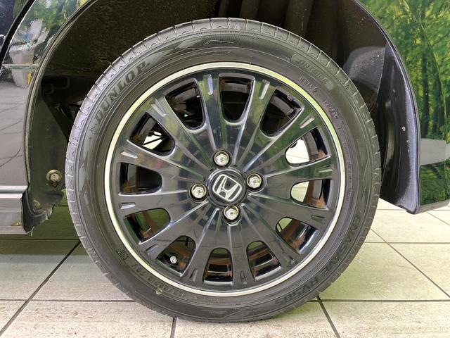 N-BOXカスタム G ターボSSブラックスタイルパッケージ 禁煙車 SDナビ CD/DVD/Bliutooth バックカメラ 両側電動スライドドア 衝突軽減装置 HIDヘッド/LEDフォグ オートライト グレード専用15インチアルミ シートヒーター(21枚目)