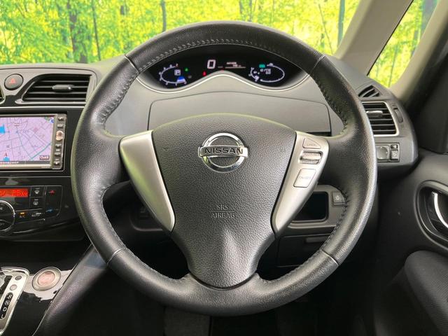 セレナ ハイウェイスター　禁煙車　純正ナビ　バックカメラ　ＣＤ／ＤＶＤ／フルセグ　Ｂｌｕｅｔｏｏｔｈ接続　純正フリップダウンモニター　両側電動スライドドア　ＨＩＤヘッドライト　オートライト　革巻きステアリング　オートエアコン（10枚目）