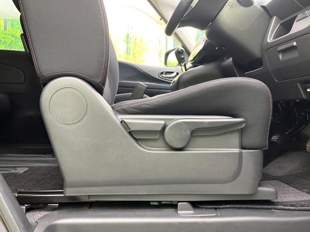 セレナ ハイウェイスター　禁煙車　純正ナビ　バックカメラ　ＣＤ／ＤＶＤ／フルセグ　Ｂｌｕｅｔｏｏｔｈ接続　純正フリップダウンモニター　両側電動スライドドア　ＨＩＤヘッドライト　オートライト　革巻きステアリング　オートエアコン（58枚目）