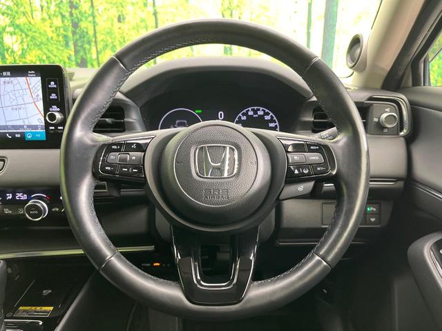 ヴェゼル ｅ：ＨＥＶ　Ｚ　４ＷＤ　禁煙車　純正９型ディスプレイ　全周囲カメラ　フルセグ　Ｂｌｕｅｔｏｏｔｈ接続　衝突軽減装置　レーンアシスト　ＬＥＤヘッド／フォグ　オートハイビーム　シーケンシャルターンランプ　電動リアゲート（11枚目）