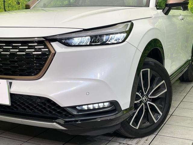 ヴェゼル ｅ：ＨＥＶ　Ｚ　４ＷＤ　禁煙車　純正９型ディスプレイ　全周囲カメラ　フルセグ　Ｂｌｕｅｔｏｏｔｈ接続　衝突軽減装置　レーンアシスト　ＬＥＤヘッド／フォグ　オートハイビーム　シーケンシャルターンランプ　電動リアゲート（12枚目）