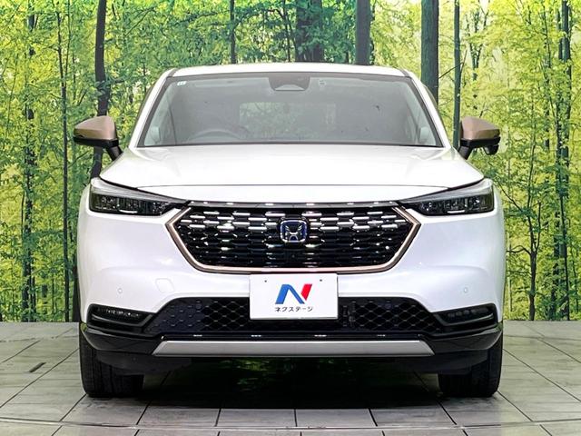 ヴェゼル ｅ：ＨＥＶ　Ｚ　４ＷＤ　禁煙車　純正９型ディスプレイ　全周囲カメラ　フルセグ　Ｂｌｕｅｔｏｏｔｈ接続　衝突軽減装置　レーンアシスト　ＬＥＤヘッド／フォグ　オートハイビーム　シーケンシャルターンランプ　電動リアゲート（14枚目）