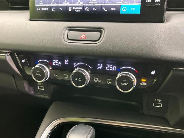 ヴェゼル ｅ：ＨＥＶ　Ｚ　４ＷＤ　禁煙車　純正９型ディスプレイ　全周囲カメラ　フルセグ　Ｂｌｕｅｔｏｏｔｈ接続　衝突軽減装置　レーンアシスト　ＬＥＤヘッド／フォグ　オートハイビーム　シーケンシャルターンランプ　電動リアゲート（54枚目）