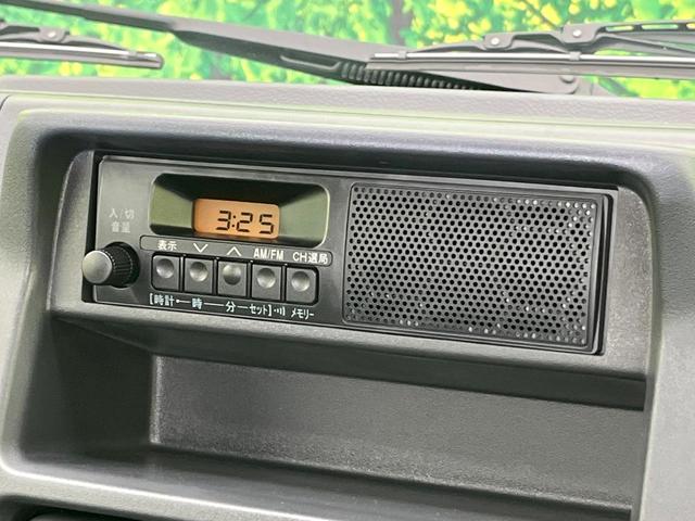 キャリイトラック KCエアコン・パワステ パートタイム4WD 禁煙車 後期型 5速MT 純正オーディオ パーキングセンサー オートライト パワーウィンドウ エアコン/パワーステアリング リアリーフサスペンション 3方開荷台 キーレスキー(3枚目)