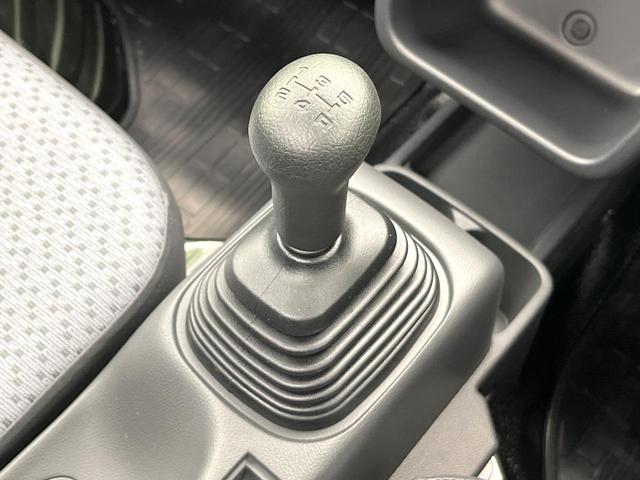 キャリイトラック KCエアコン・パワステ パートタイム4WD 禁煙車 後期型 5速MT 純正オーディオ パーキングセンサー オートライト パワーウィンドウ エアコン/パワーステアリング リアリーフサスペンション 3方開荷台 キーレスキー(4枚目)