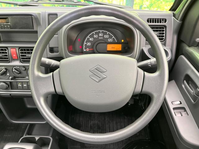 キャリイトラック KCエアコン・パワステ パートタイム4WD 禁煙車 後期型 5速MT 純正オーディオ パーキングセンサー オートライト パワーウィンドウ エアコン/パワーステアリング リアリーフサスペンション 3方開荷台 キーレスキー(11枚目)