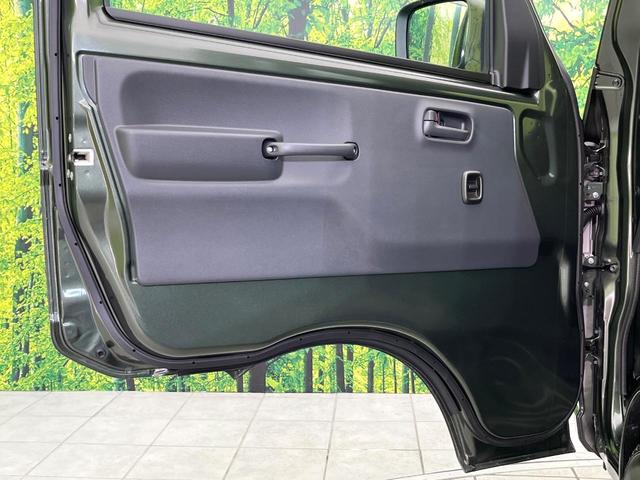 キャリイトラック KCエアコン・パワステ パートタイム4WD 禁煙車 後期型 5速MT 純正オーディオ パーキングセンサー オートライト パワーウィンドウ エアコン/パワーステアリング リアリーフサスペンション 3方開荷台 キーレスキー(23枚目)