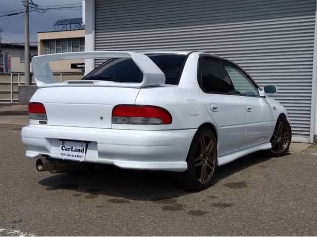 インプレッサ ＷＲＸ　ＳＴｉバージョンＶ　ユーザー買取車　ＴＥＩＮ車高調　ＥＴＣ　５速マニュアル　ターボ　社外アルミホイール　ピュアホワイト　ターボタイマー　ＣＤ再生　ピュアホワイト　下廻り洗浄、塗装済み　取扱説明書　メンテナンスノート（41枚目）