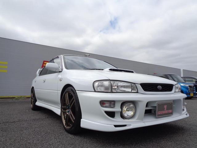 ＷＲＸ　ＳＴｉバージョンＶ　ユーザー買取車　ＴＥＩＮ車高調　ＥＴＣ　５速マニュアル　ターボ　社外アルミホイール　ピュアホワイト　ターボタイマー　ＣＤ再生　ピュアホワイト　下廻り洗浄、塗装済み　取扱説明書　メンテナンスノート(47枚目)