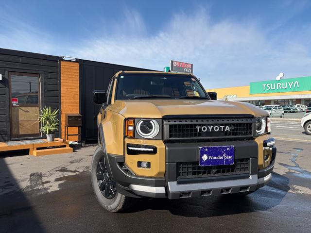 ランドクルーザー250 VXファーストエディション ワンオーナー モデリスタ 丸目レンズ サンルーフ ルーフレール 茶革シート 純正ディスプレイオーディオ フルセグ Bluetooth 360°カメラ デジタルインナーミラー シートヒーター・クーラー(3枚目)