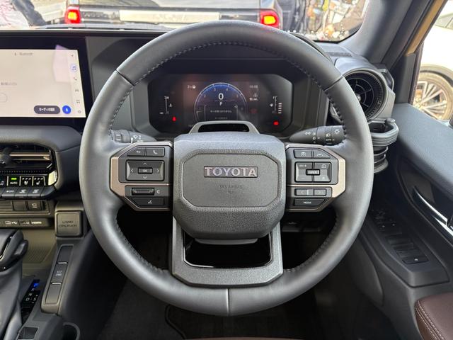 ランドクルーザー250 VXファーストエディション ワンオーナー モデリスタ 丸目レンズ サンルーフ ルーフレール 茶革シート 純正ディスプレイオーディオ フルセグ Bluetooth 360°カメラ デジタルインナーミラー シートヒーター・クーラー(10枚目)