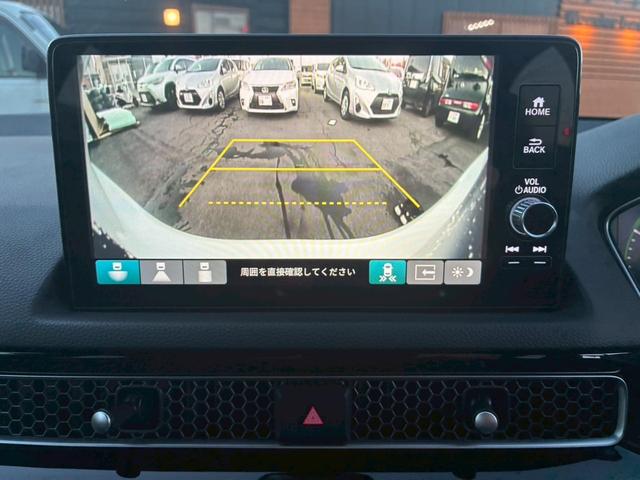 シビック ｅ：ＨＥＶ　ワンオーナー　テールゲートスポイラー　ハーフレザー　純正ナビ　フルセグ　Ｂｌｕｅｔｏｏｔｈ　アップルカープレイ　バックカメラ　ステアリモコン　クルコン　シートヒーター　コーナーセンサー　ＥＴＣ（33枚目）