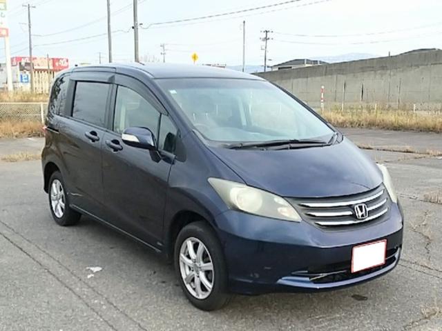 フリード フレックス　４ＷＤ　１セグ付ナビ　１５ＩＣアルミ　ＥＴＣ　キーレスＥ　助手席側電動スライドドア　フルフラット　ウォークスルー　ＡＢＳ　ＥＳＣ　運転席エアバック　助手席エアバック　電動格納ミラー　衝突安全ボディ（6枚目）