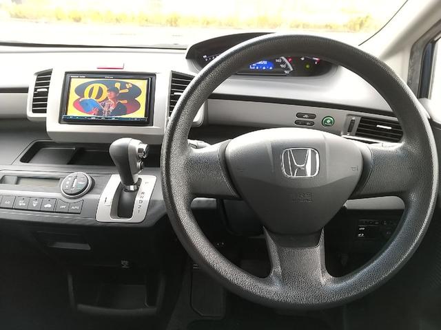 フリード フレックス　４ＷＤ　１セグ付ナビ　１５ＩＣアルミ　ＥＴＣ　キーレスＥ　助手席側電動スライドドア　フルフラット　ウォークスルー　ＡＢＳ　ＥＳＣ　運転席エアバック　助手席エアバック　電動格納ミラー　衝突安全ボディ（15枚目）