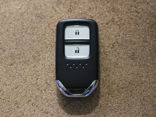 �X�}�[�g�L�[�ł��B�L�[���g�т��Ă��邾���ŁA�h�A���b�N�̊J��G���W���̎n�����\�ł��B